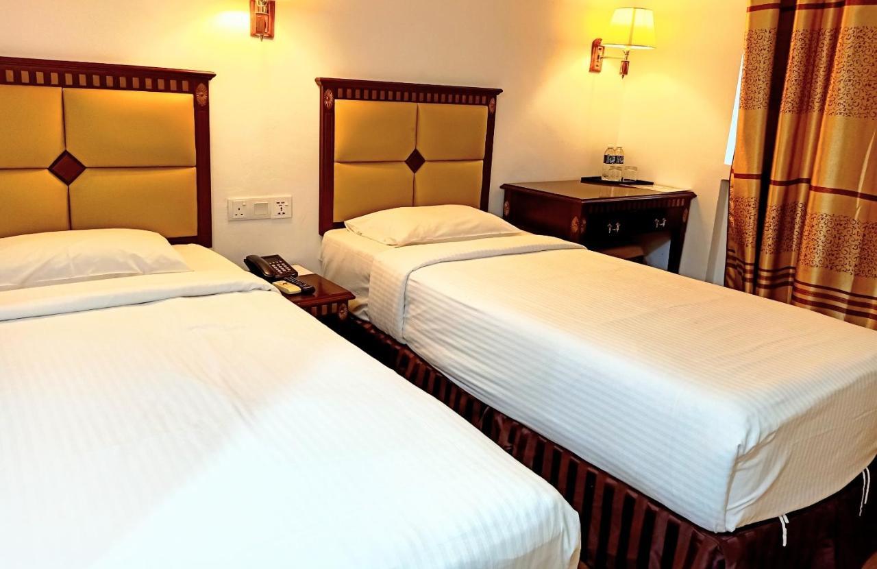 Super Oyo 90464 Borneo Suites Hotel Kota Kinabalu Exterior photo
